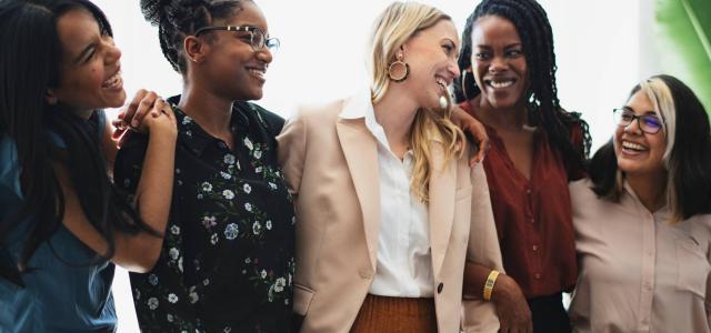professional women in happy conversation
